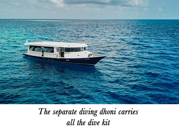 The separate diving dhoni carries all the dive kit